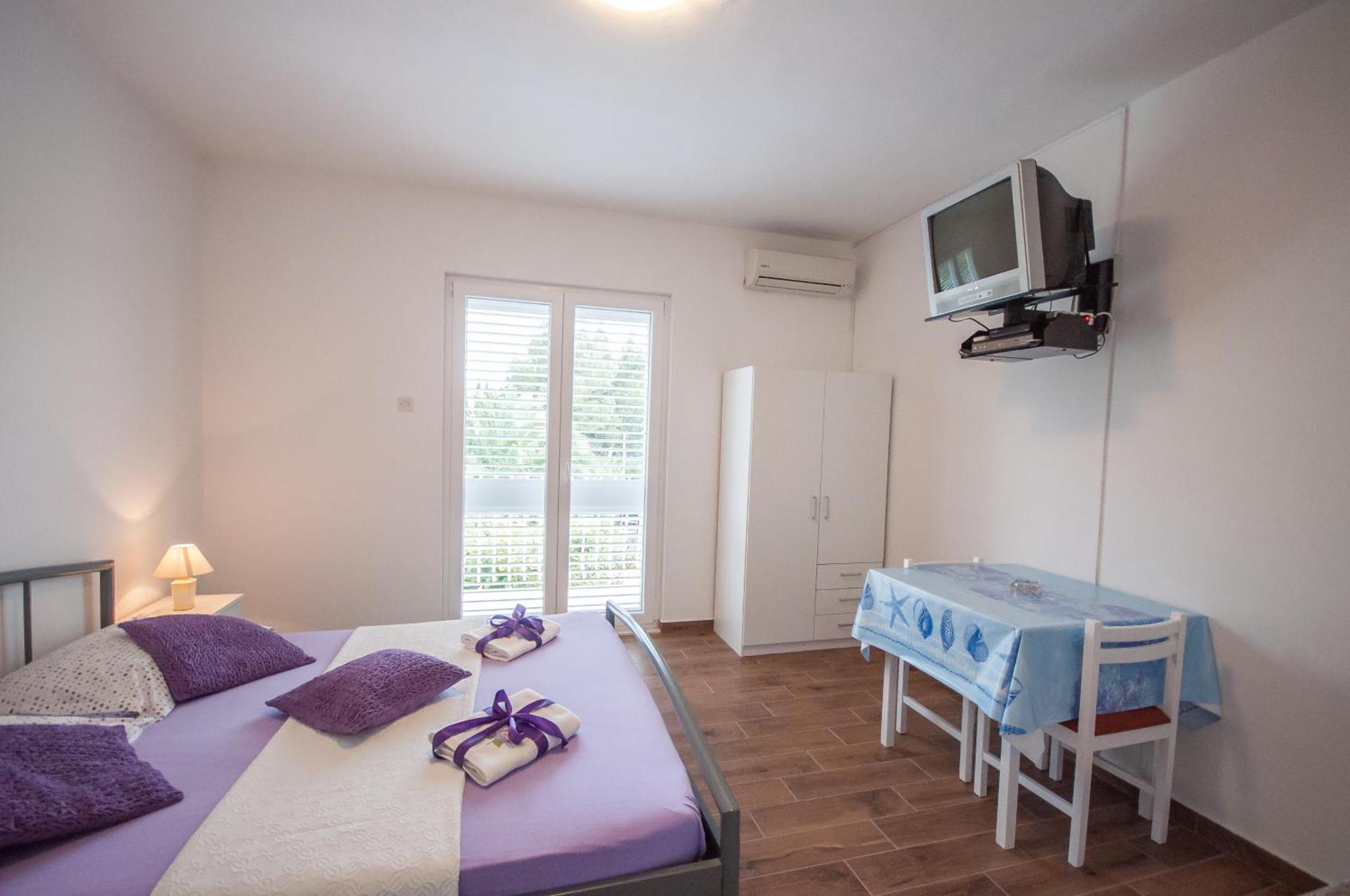 Apartments Srijemsi Mlini Pokoj fotografie